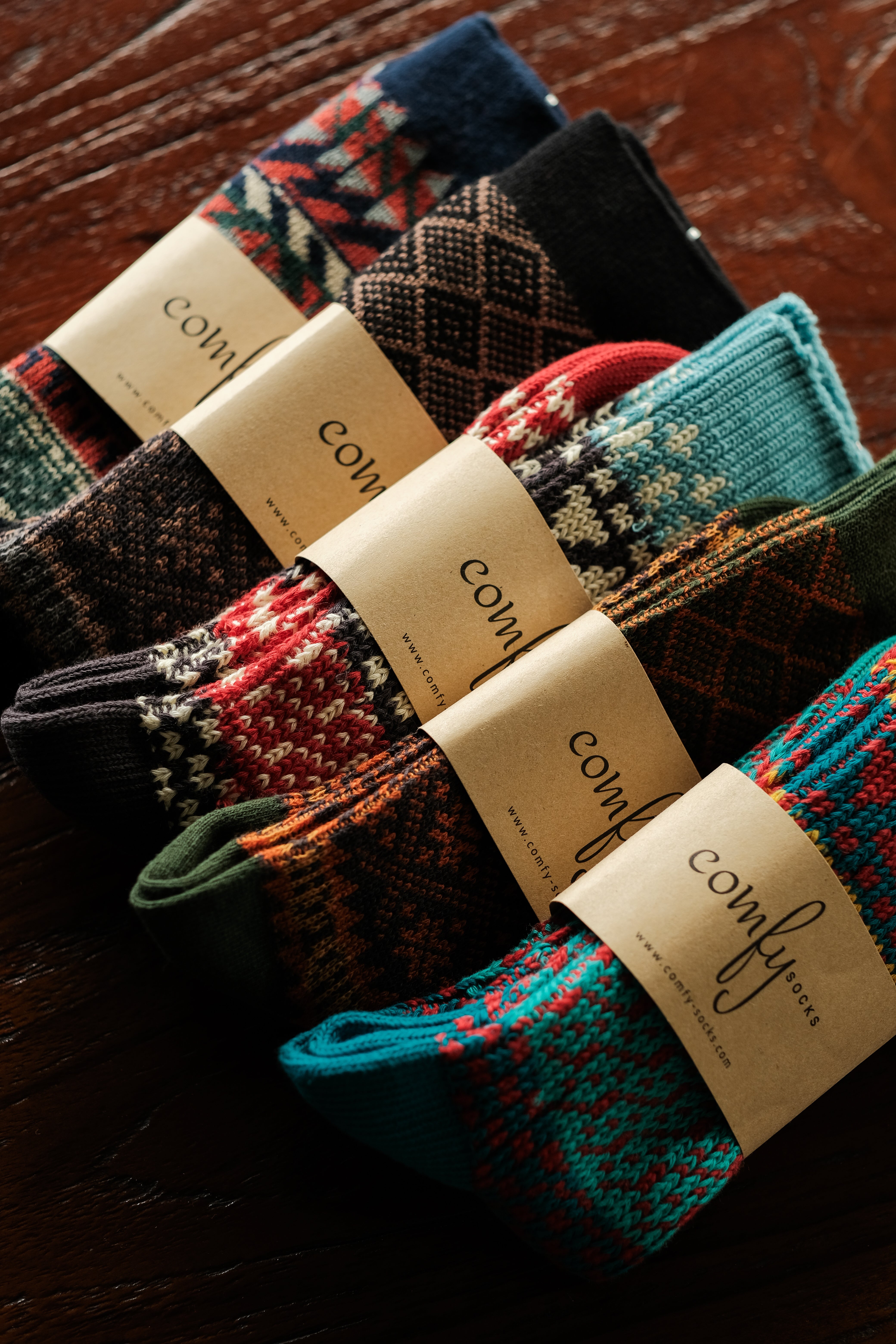 Best seller socks in bold tribal patterns, funky stripes, and colorful cotton crew designs for men and women, displayed on neutral background.