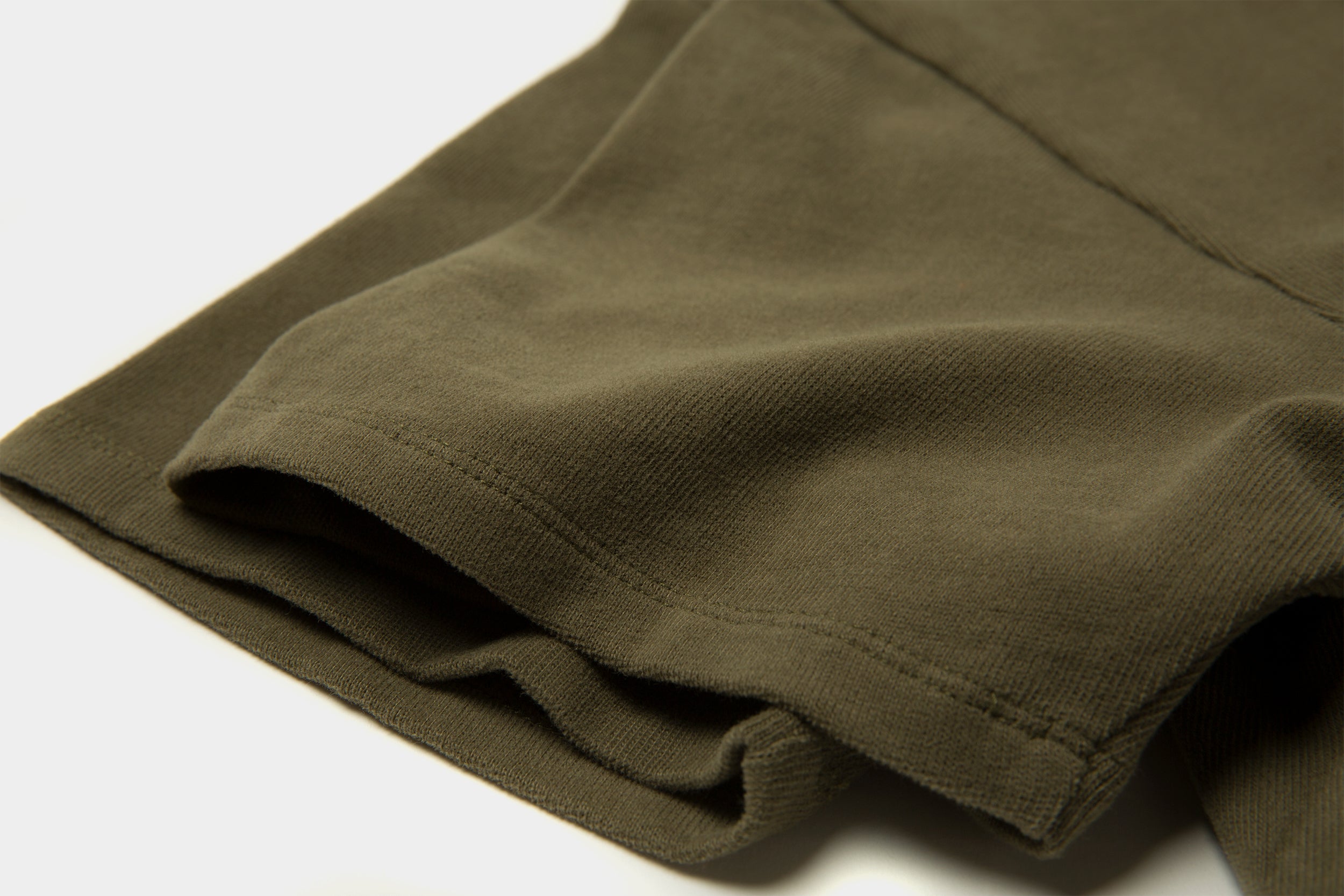 American Cotton crewneck tee in Olive Green flat lay close up