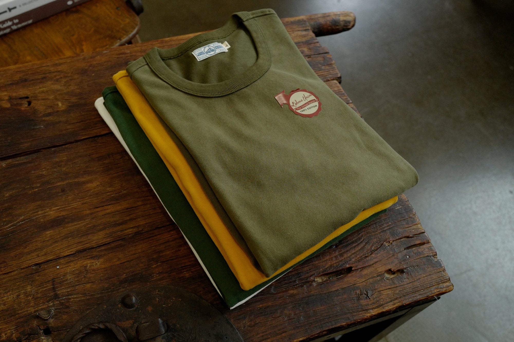 Close-up of Forest Green crewneck tee on model, vintage fit