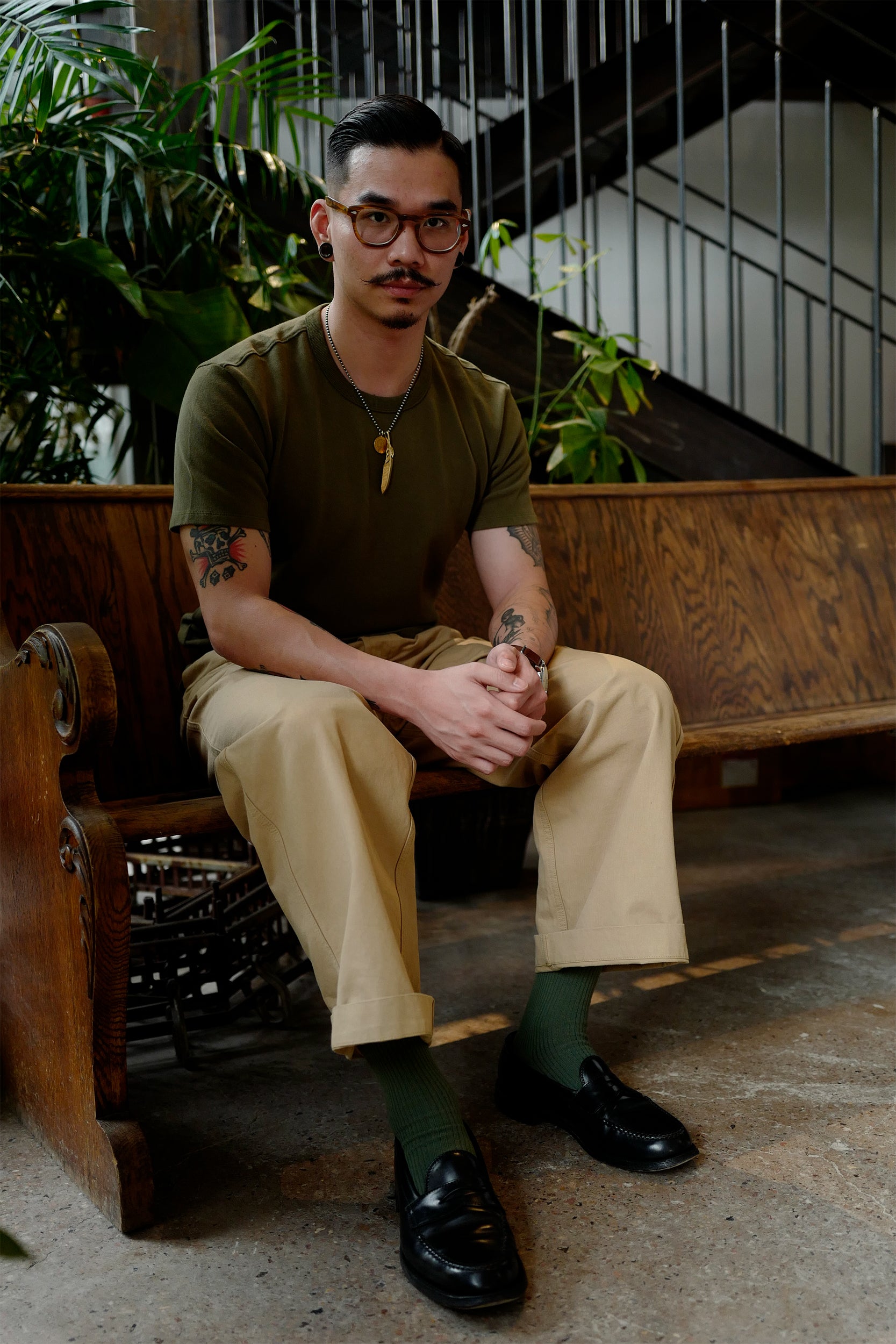 Close-up of Forest Green crewneck tee on model, vintage fit