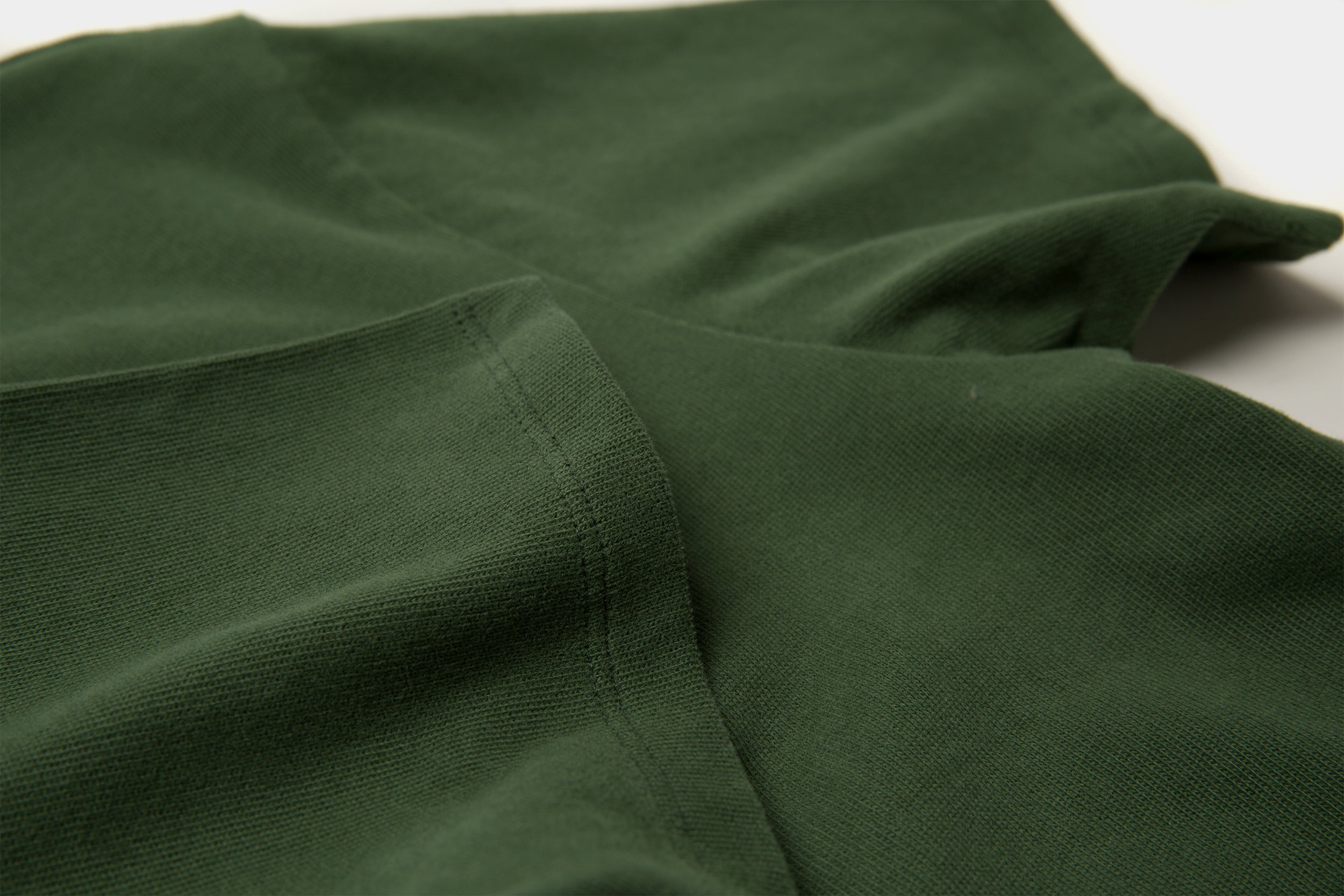 close up of Olive Green crewneck tee front and back view on white background