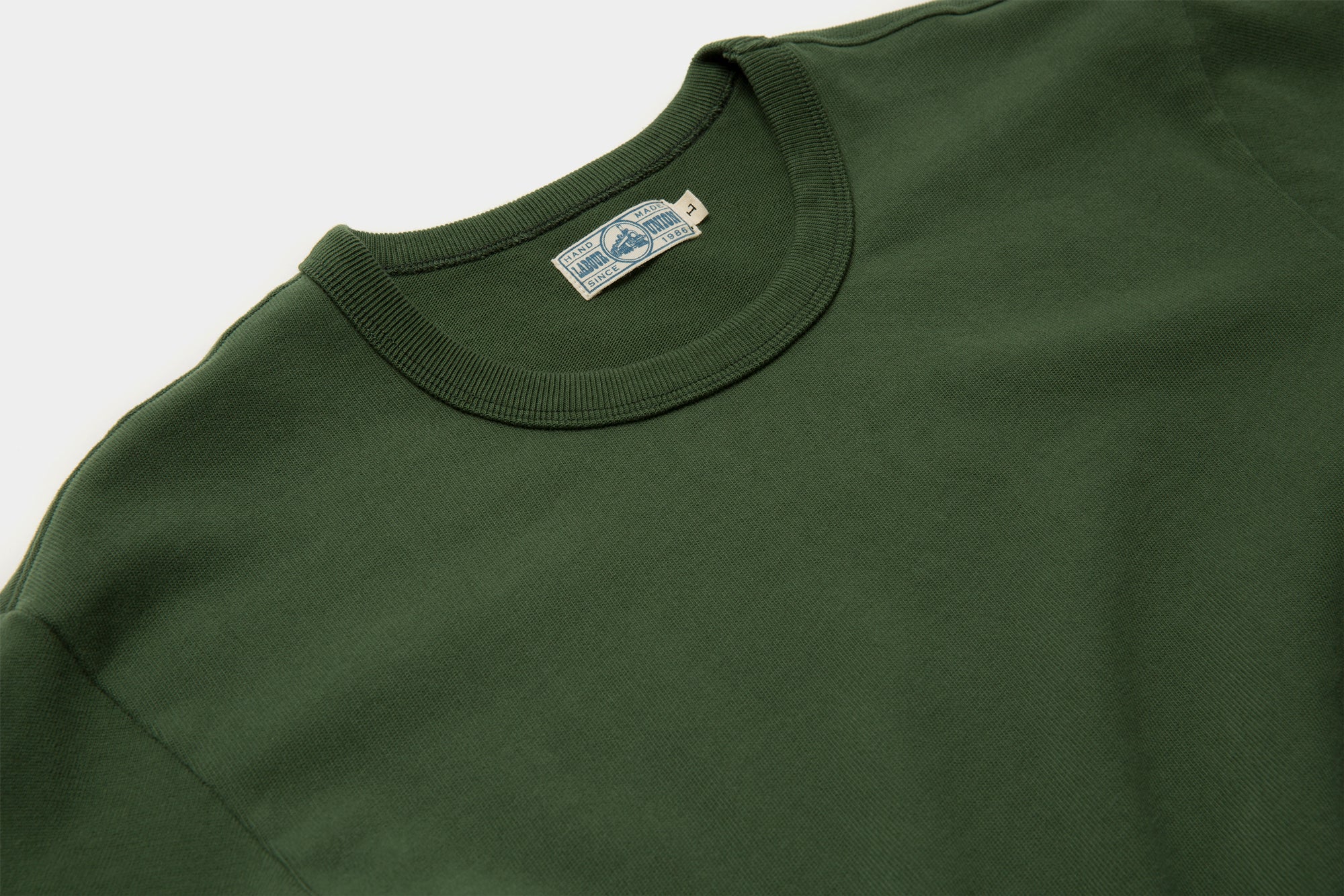 Close-up texture of American Cotton fabric in Forest Green