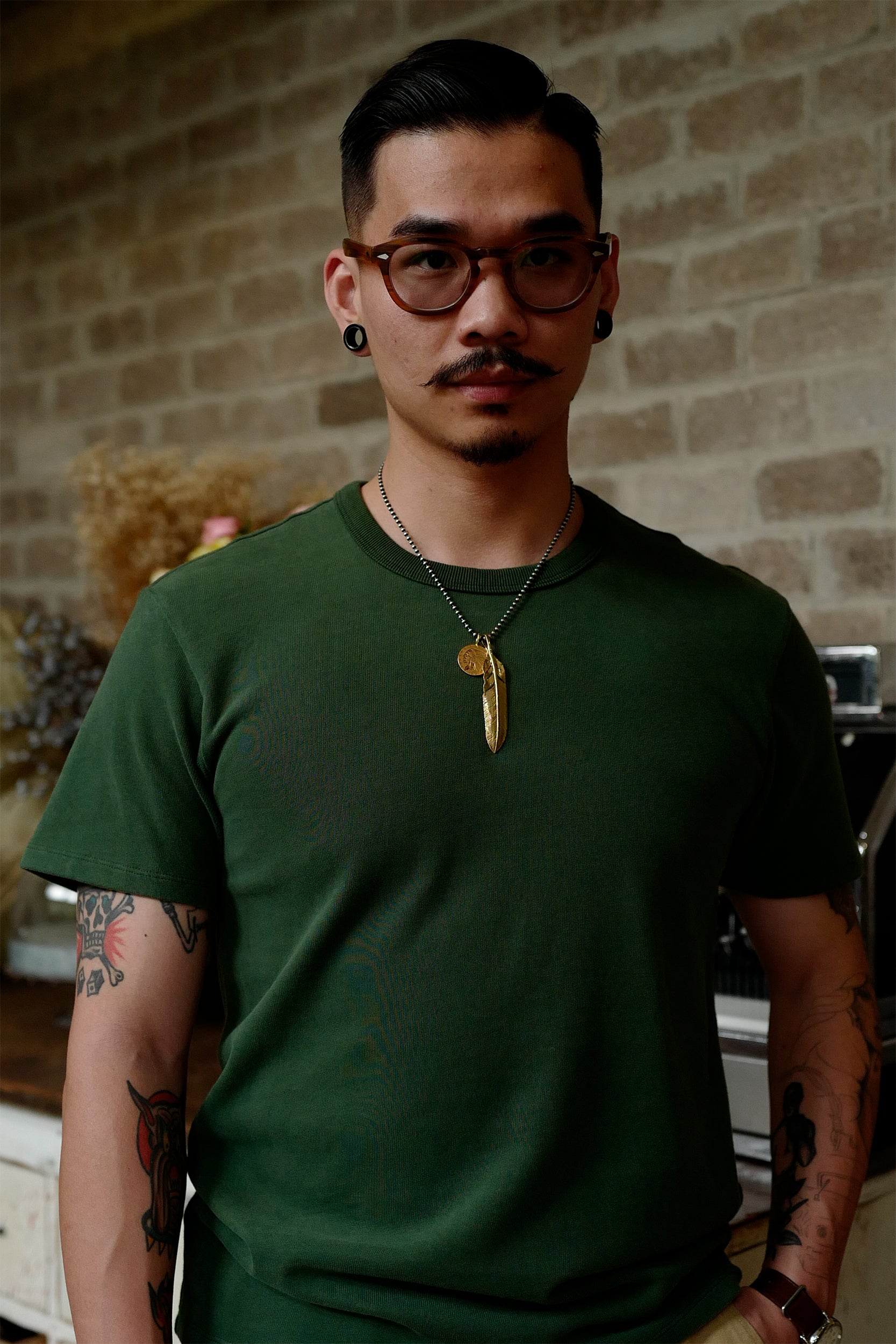 Model wearing American Cotton crewneck tee in Olive Green, size L, casual vintage style