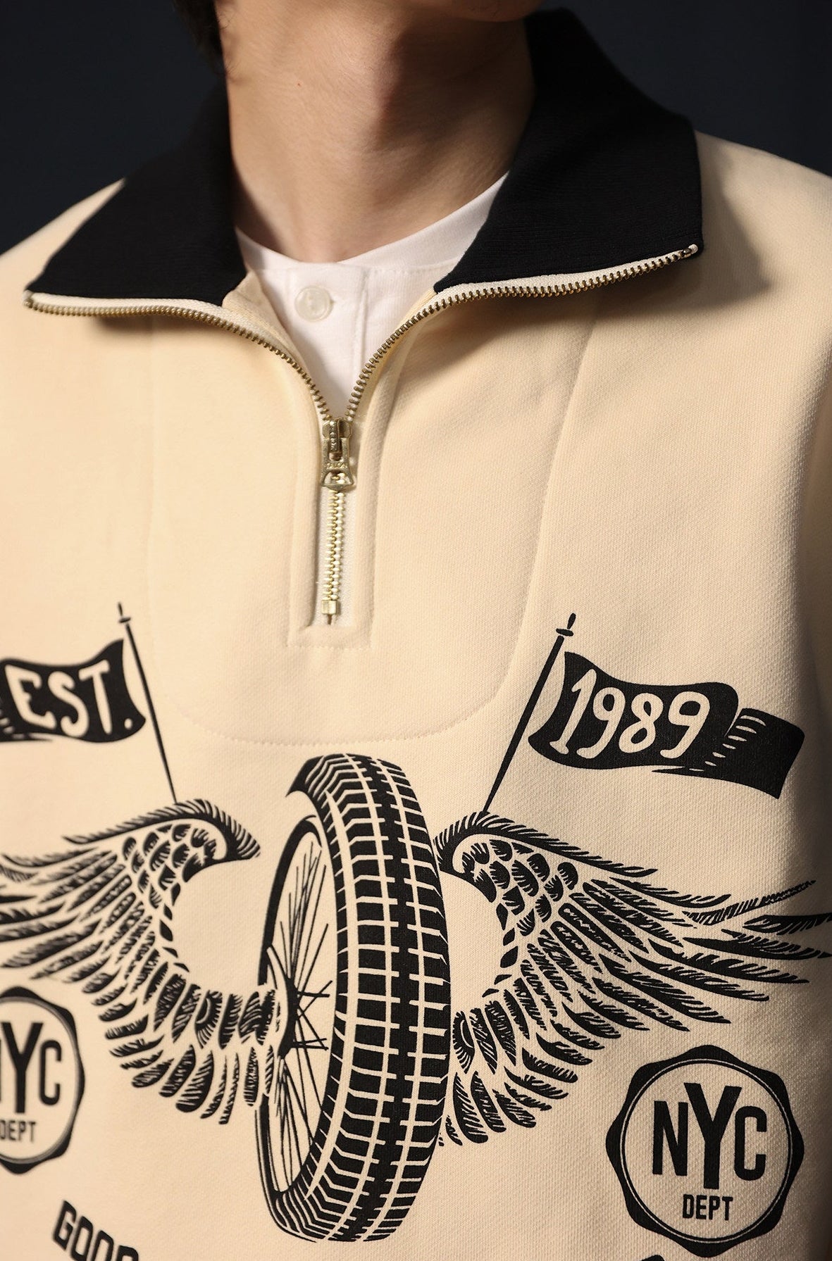 winged motorcycle wheel graphic sweatshirt detail