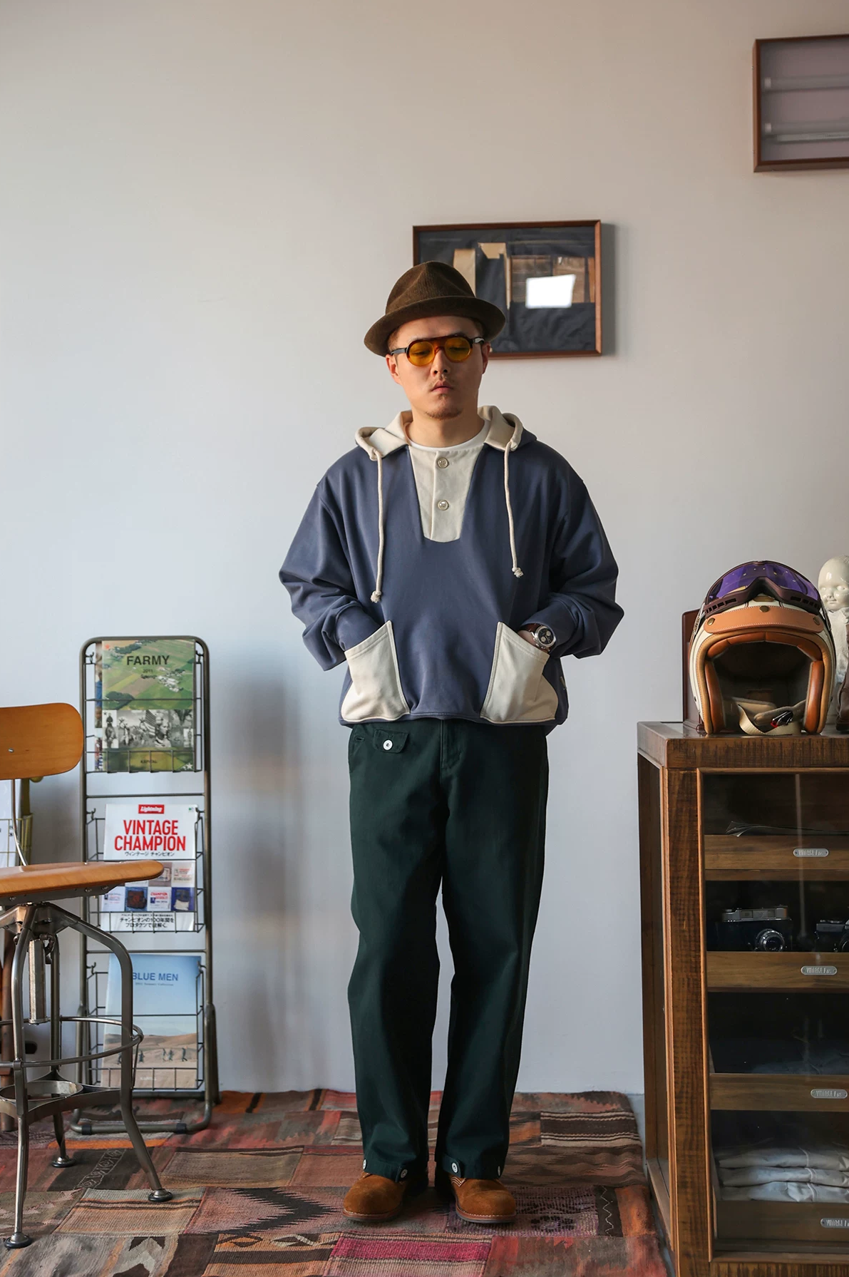 Vintage-inspired hooded sweatshirt with contrast design and heavyweight cotton. Comfortable, structured fit for everyday wear and layering.