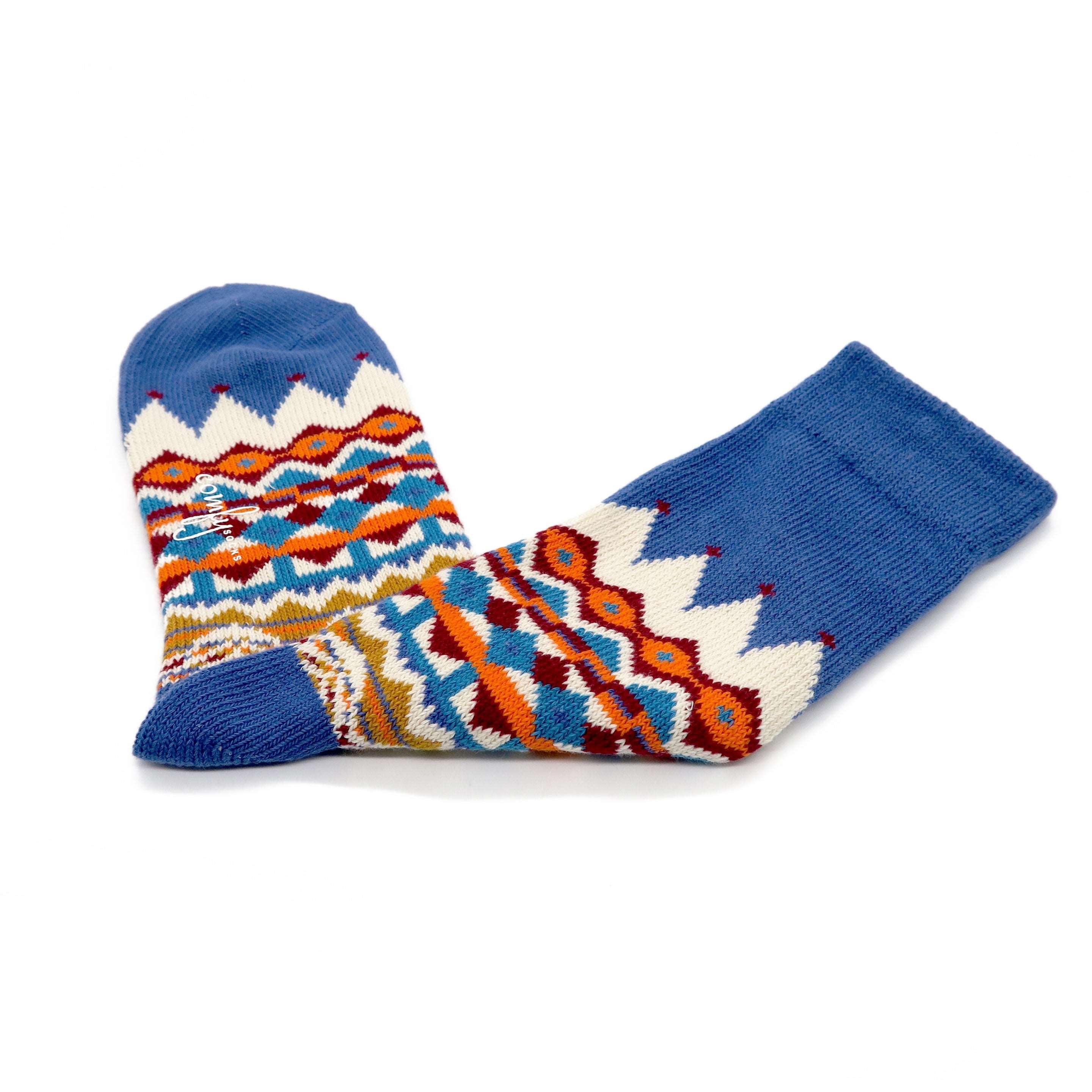 Thick indigo cotton crew socks with bold tribal zigzag motifs.