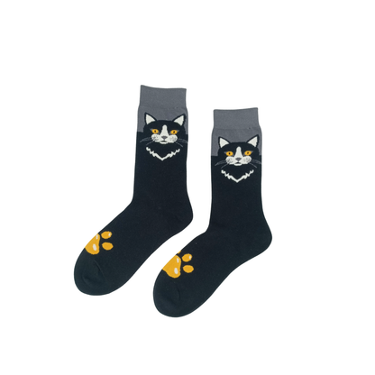 Black cat face cotton socks with yellow eyes and paw print detail – Midnight Cat by ComfySocks