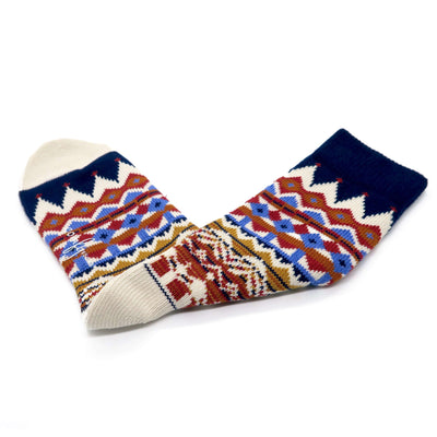 Thick navy cotton crew socks with bold tribal chevron design.