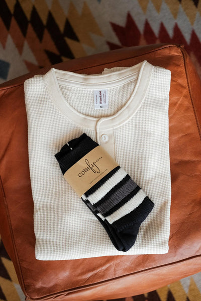 henly beige shirt with model with stripe socks