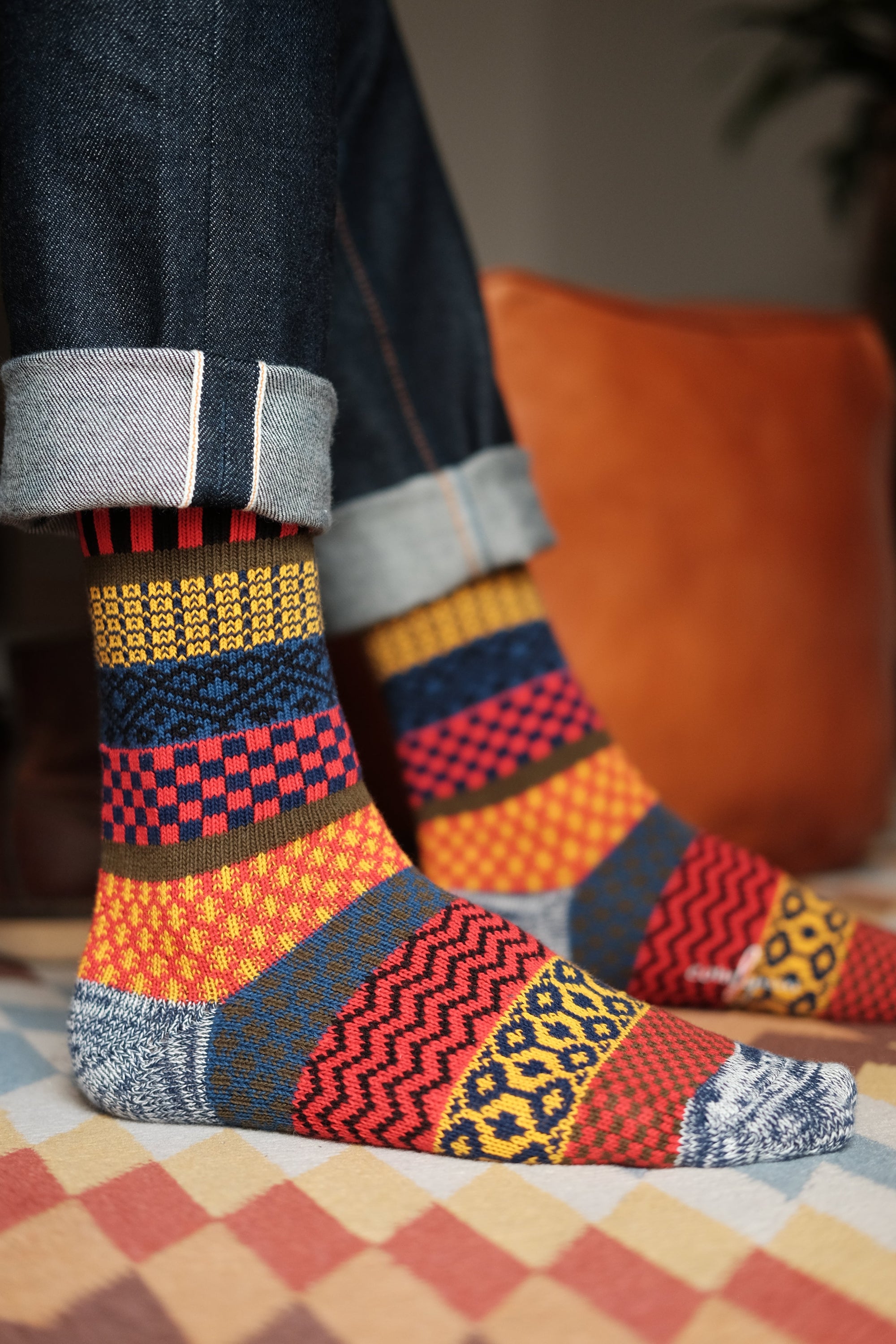 Izumi red tribal pattern crew socks worn in everyday outfit – ComfySocks
