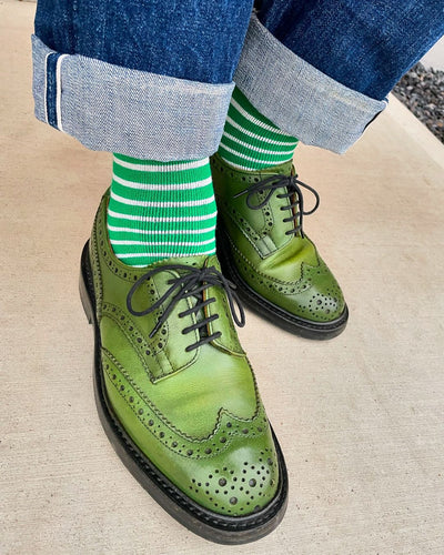 Japanese Thick Green Stripe Socks styled with green leather shoes, cozy crew fit.