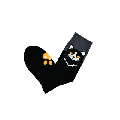 Black cat face cotton socks with yellow eyes and paw print detail – Midnight Cat by ComfySocks 2
