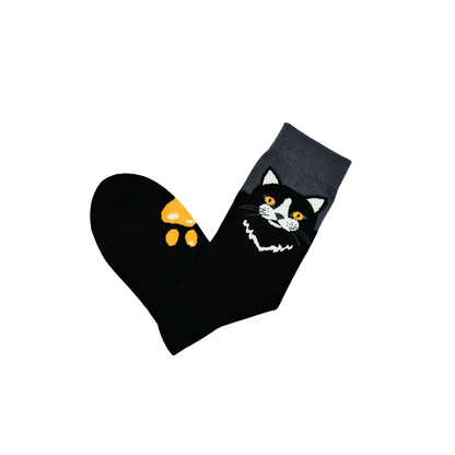 Black cat face cotton socks with yellow eyes and paw print detail – Midnight Cat by ComfySocks 2