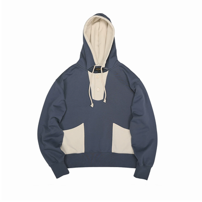 model wearing navy cream hoodie relaxed fit