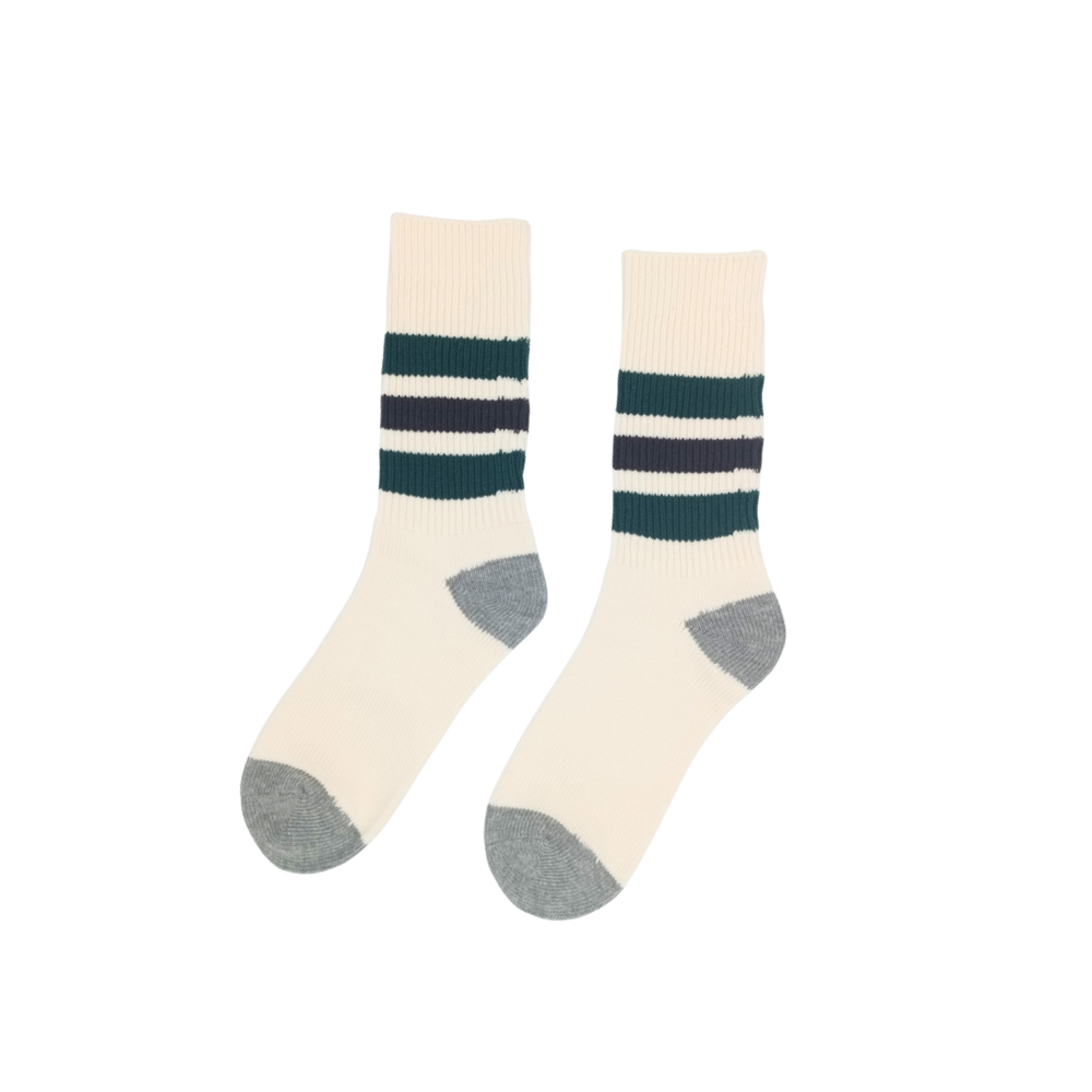 Riki striped socks in cream with green and navy stripes, grey heel and toe, displayed on white background.