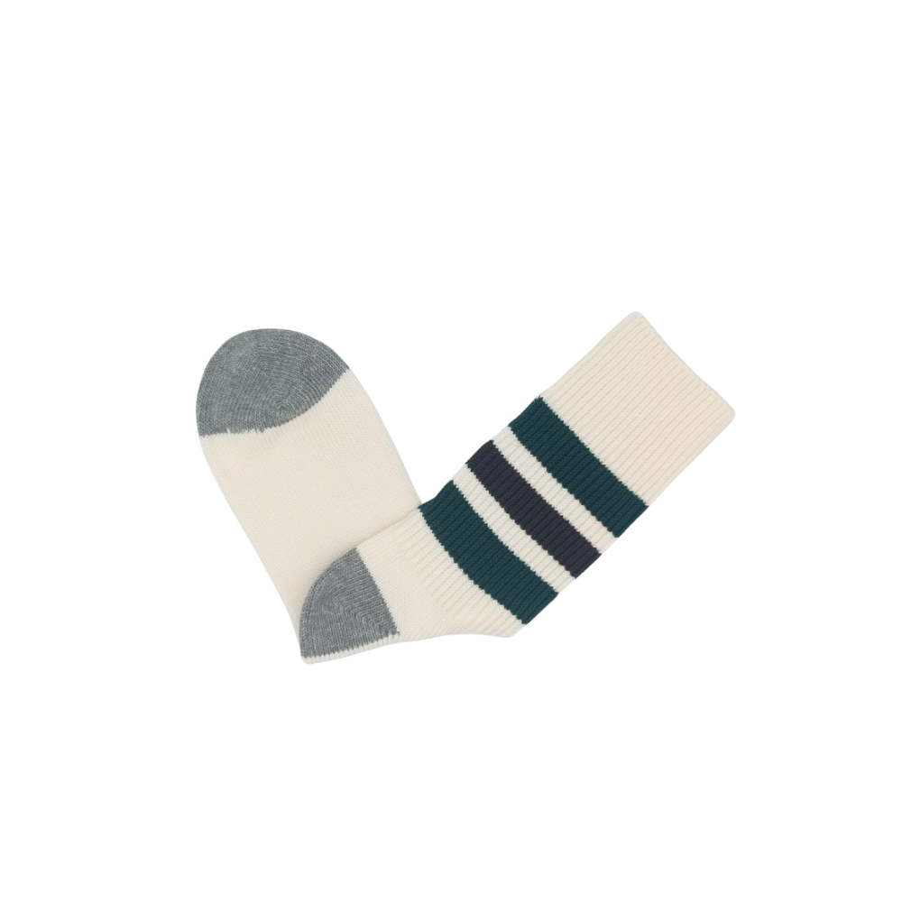 Retro Riki striped cotton crew socks folded flat with cream base and green/navy stripes.