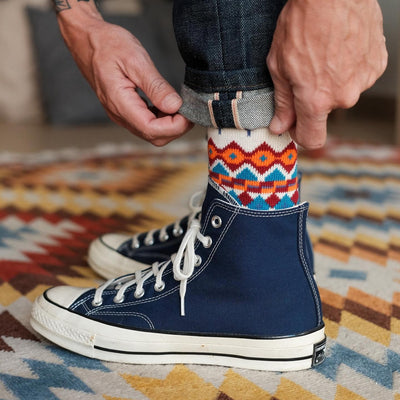 Tanami Indigo socks styled with blue converse chucks